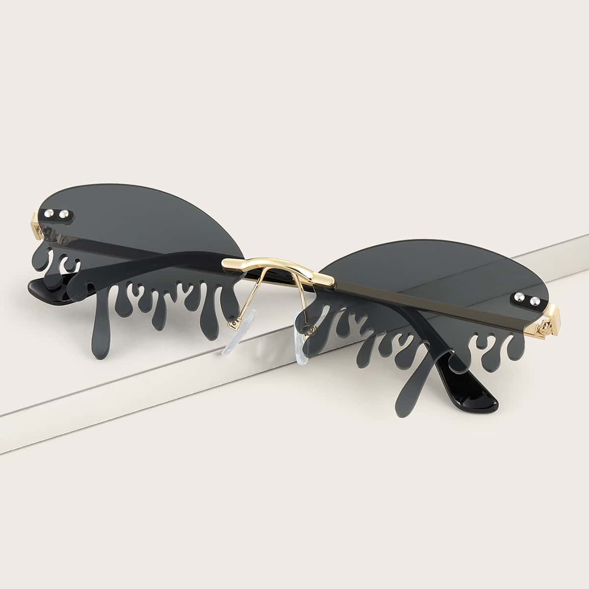 

Rimless Water Drop Frame Sunglasses
