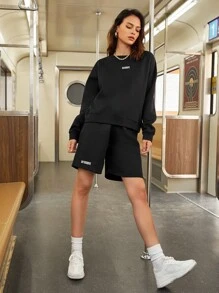 SHEIN Unity Conjunto pullover con letra de hombros caídos con shorts - Negro - Ver 1