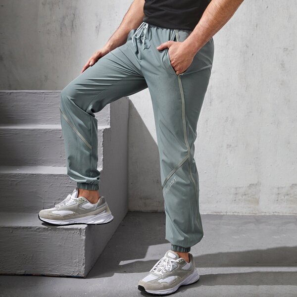 

Men Drawstring Waist Letter Graphic Sport Pants, Dusty blue