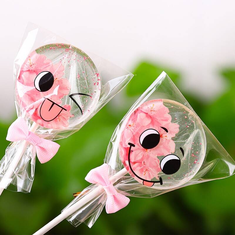 

100pcs Cartoon Graphic Random Lollipop Packaging Bag, Clear