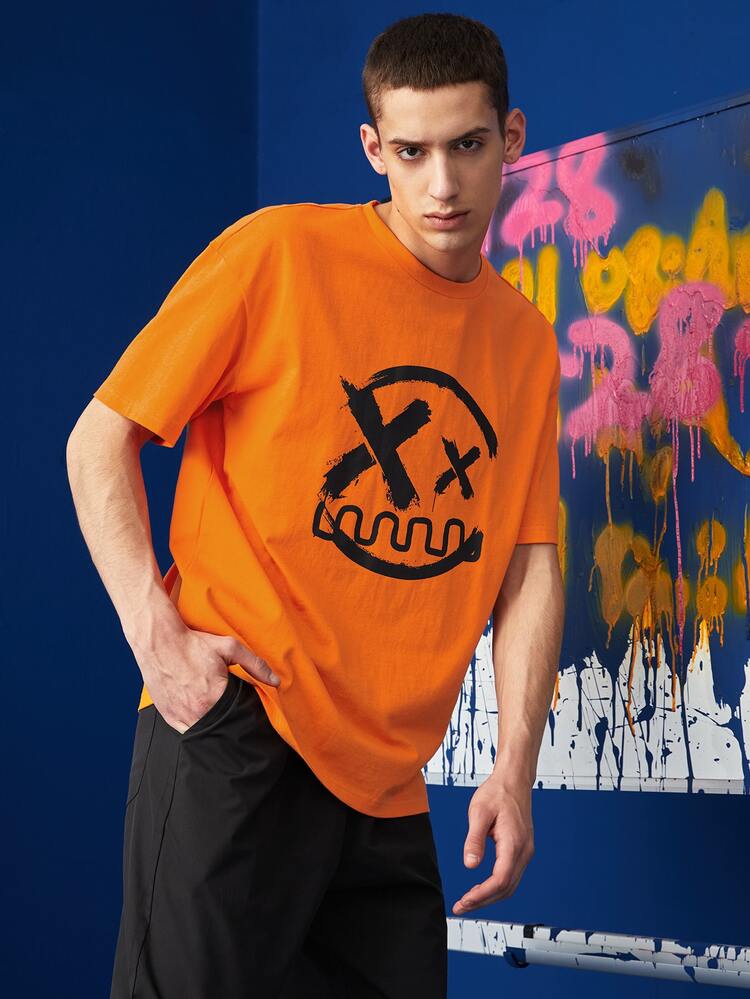 Manfinity Blusa de dibujos animados naranja fluorescente para hombre - Naranja - Añade 5