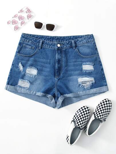 Shorts en mezclilla bajo de doblez desgarro