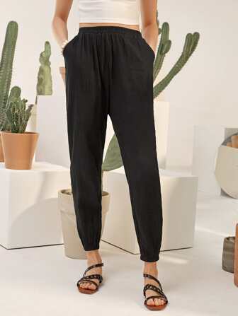 Pantaloni a sigaretta con tasca frontale