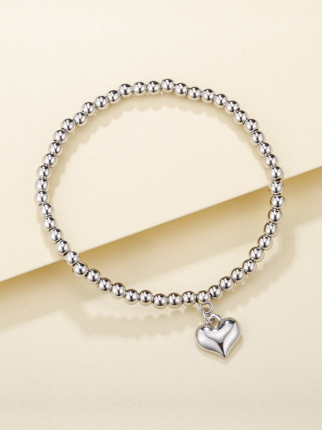Bracciale di perline pendente con cuore