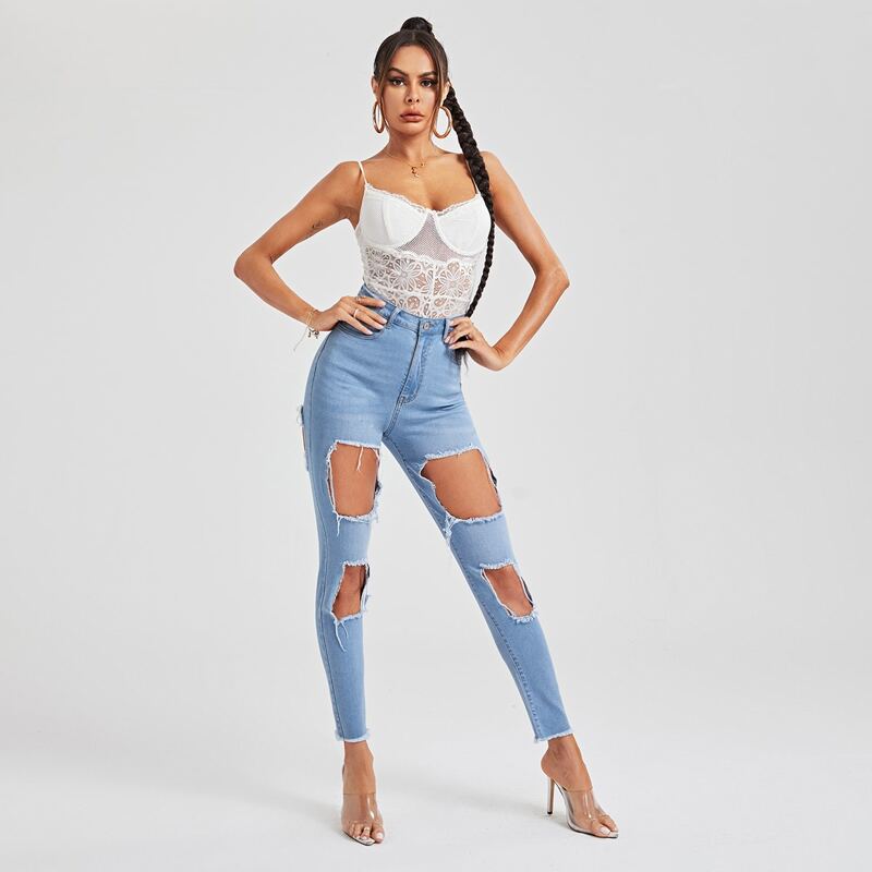 

High Waist Ripped Raw Hem Jeans, Light wash