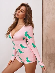 Mono pijama de cuello profundo con estampado de dinosaurio