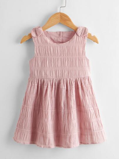 فستان متارجح بجزء مفتوح خلفي معقود الاكتاف للبنات الصغار