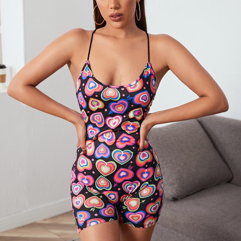 

Allover Heart Print Criss Cross Backless Unitard Romper, Multicolor