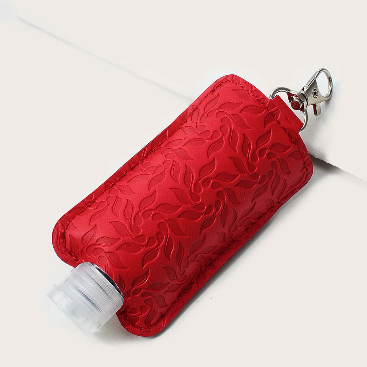 

Floral Embossed Mini Bottle Bag Charm, Red