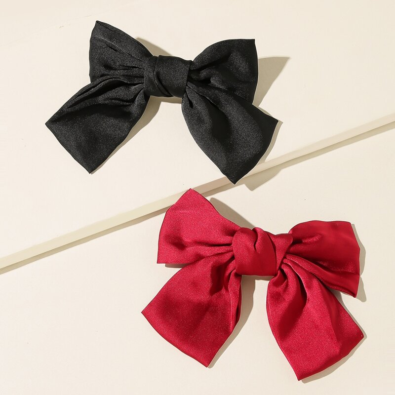 

2pcs Solid Bow Hair Clip, Multicolor