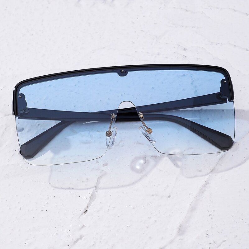 

Tinted Lens Rimless Shield Sunglasses