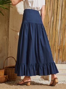 SHEIN تنورة بلون موحد وبحافة مكشكش بربطة امامي