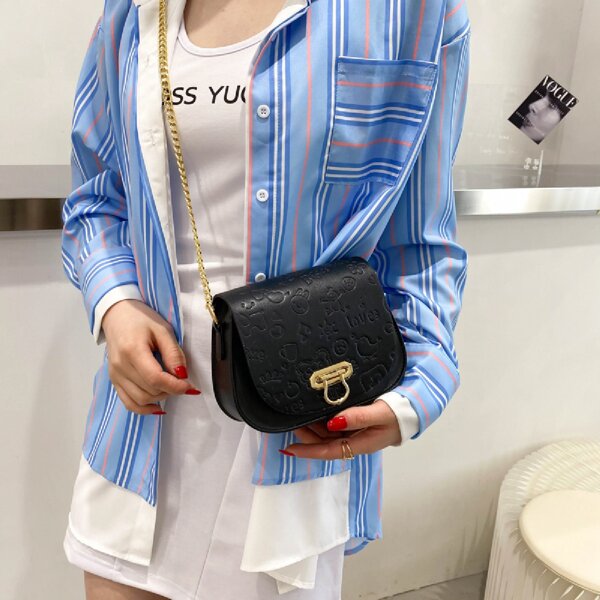 

Cartoon Embossed Flap Saddle Bag, Black
