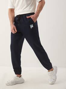 Manfinity Pantalones con estampado de letra - Azul Marino - Ver 1