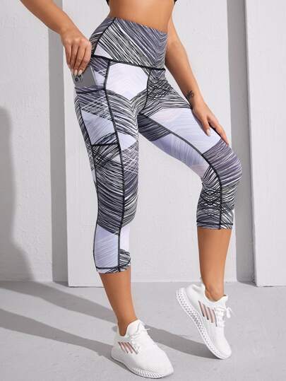 سروال رياضي نسائي بتصميم ألوان متباينة وجيب للهاتف