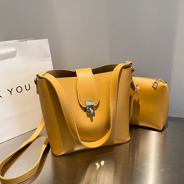 

Twist Lock Minimalist Bucket Bag, Mustard yellow