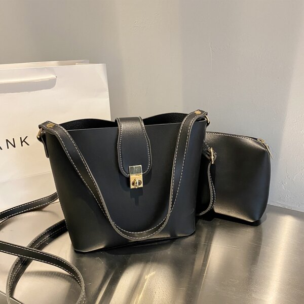 

Twist Lock Minimalist Bucket Bag, Black