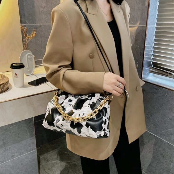 

Cow Pattern Baguette Bag, Black and white