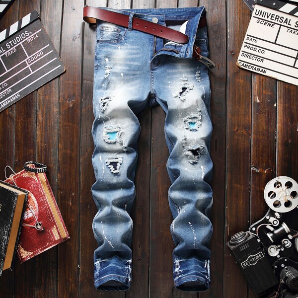 

Men Ripped Patched Paint Splatter Pattern Jeans Without Belt, Medium wash