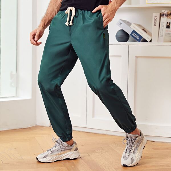 

Men Solid Patched Detail Pants, Dark green
