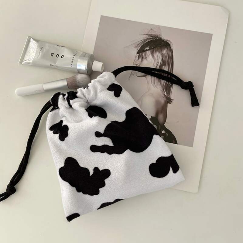

Cow Print Drawstring Storage Bag, Black and white