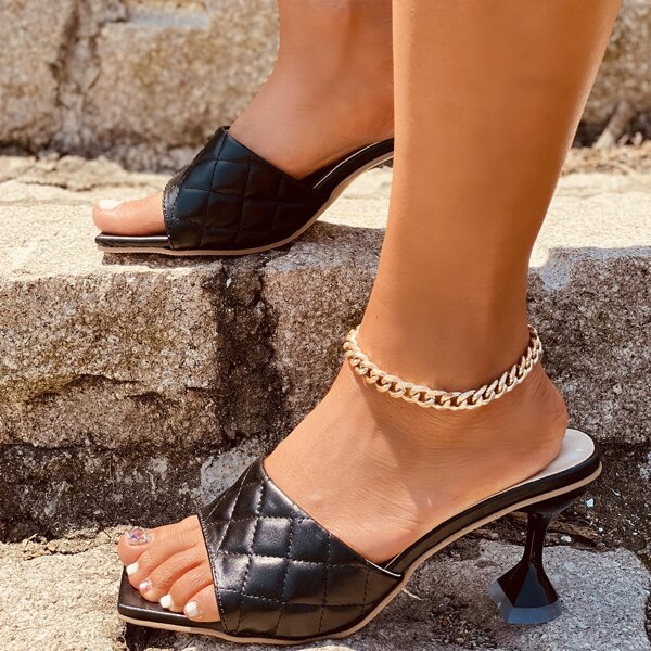 

Minimalist Quilted Pyramid Heeled Mules, Black