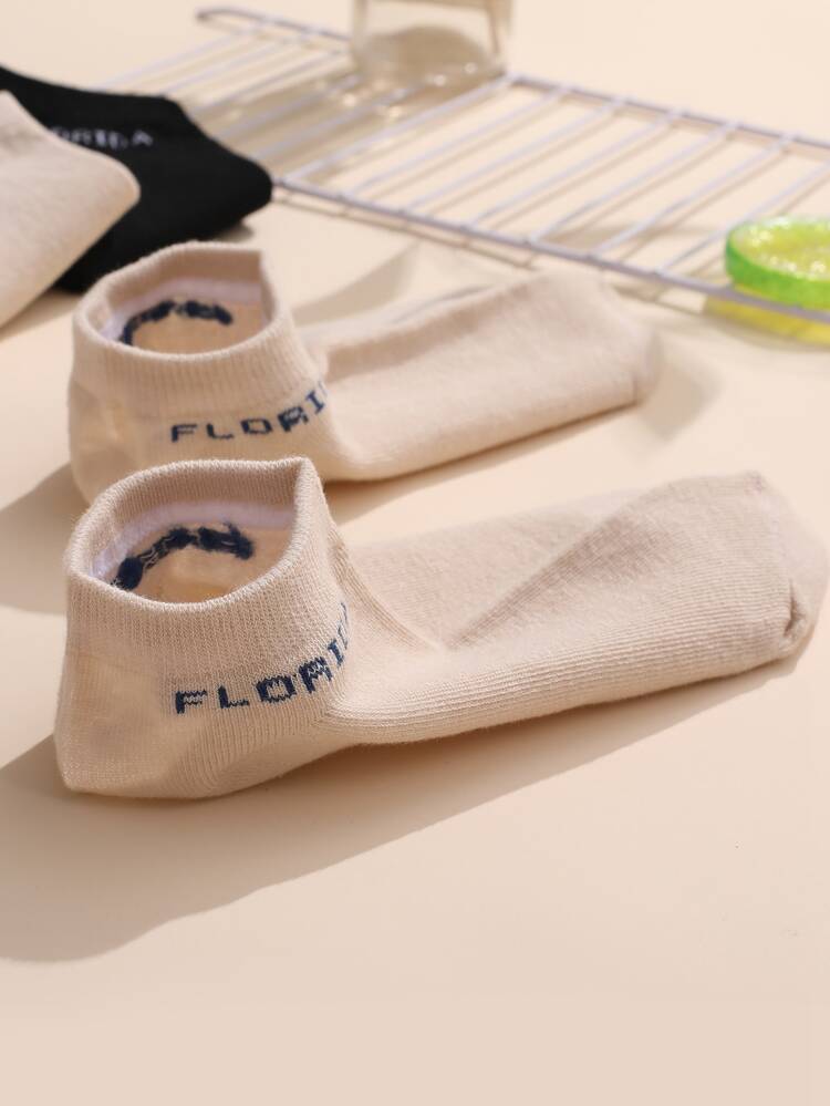 6 paia calze con lettera grafica