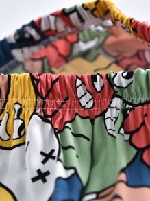 SHEIN Girls All Over Cartoon Graphic Tapered Trousers - Multicolor - View 4