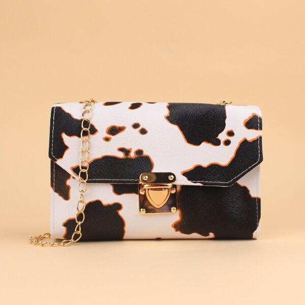 

Cow Pattern Push Lock Chain Bag, Black and white