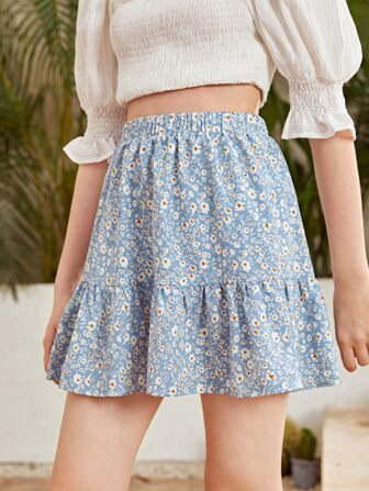 تنورة بزهر اقحوان وبحافة مكشكش للفتيات المراهقات