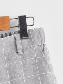 青少年男孩偏口袋格子印花褲子