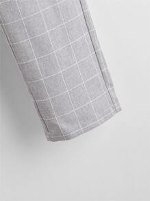 青少年男孩偏口袋格子印花褲子