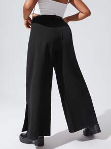 Jeans de pierna ancha con cinturón con abertura lateral - Negro - Ver 2