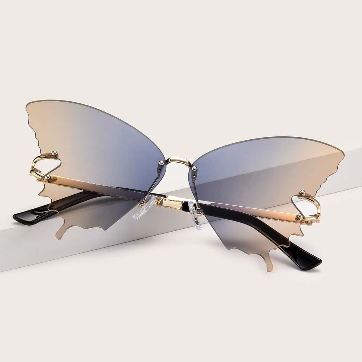 

Butterfly Lens Rimless Sunglasses