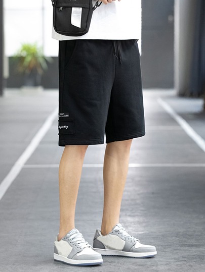 Claim Dot Men Letter Graphic Slant Pocket Shorts