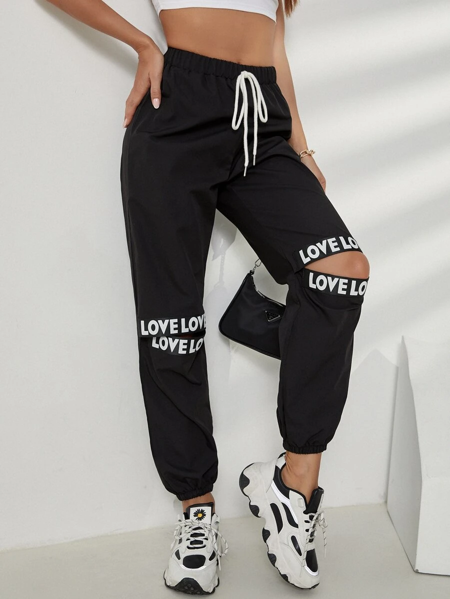 Mulvari Letter Cut Out Carrot Trousers - Black - View 1