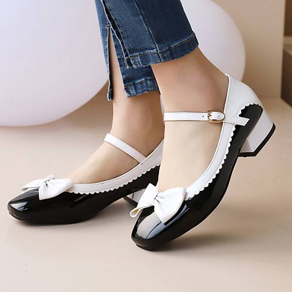

Bow Decor Two Tone Block Pumps, Black and white