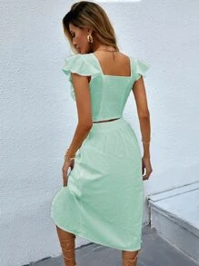 Top corto de cuello profundo con girante delantero con falda - verde menta - Ver 2