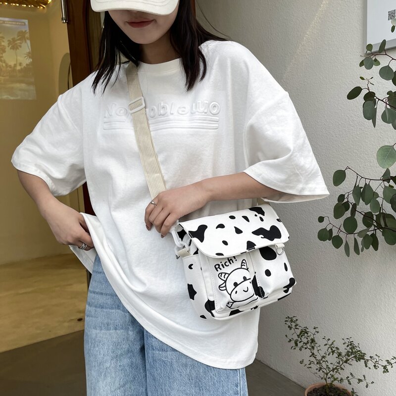 

Cow Print Crossbody Bag, Black and white