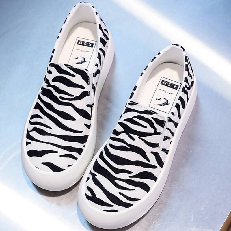 

Zebra Striped Slip On Sneakers, Black and white