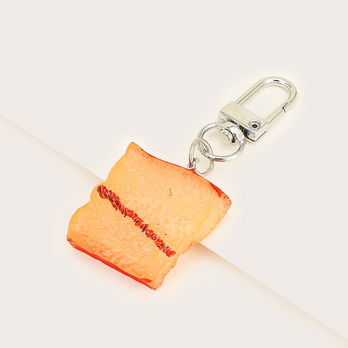 

Braised Pork Bag Charm, Yellow