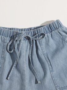 SHEIN EZwear شورت بخصر معقود وجيب مائل مرقع وحافة خام غير مخيطة