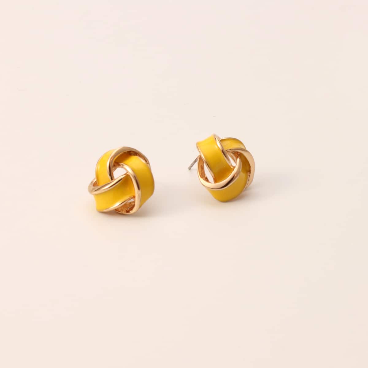 

Twist Stud Earrings, Yellow