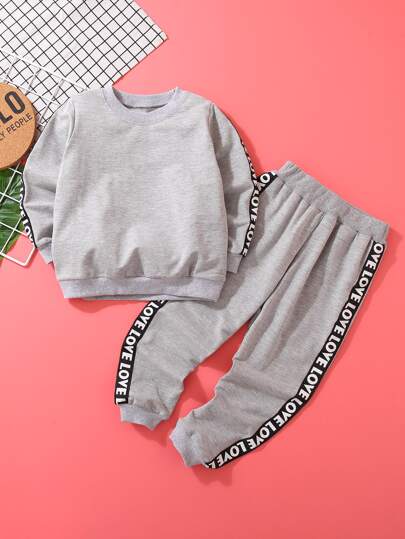 قميص ثقيل مع بنطلون رياضي شريط عبارة جانبي للولد الصغار