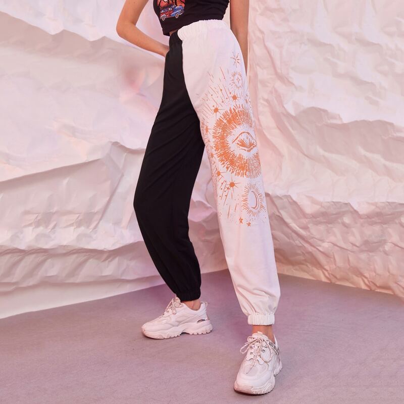 

Two Tone Eye & Moon Graphic Sweatpants, Black and white
