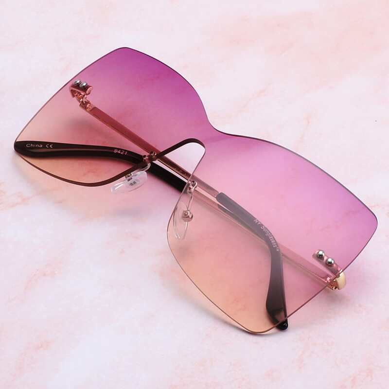 

Tinted Lens Rimless Sunglasses