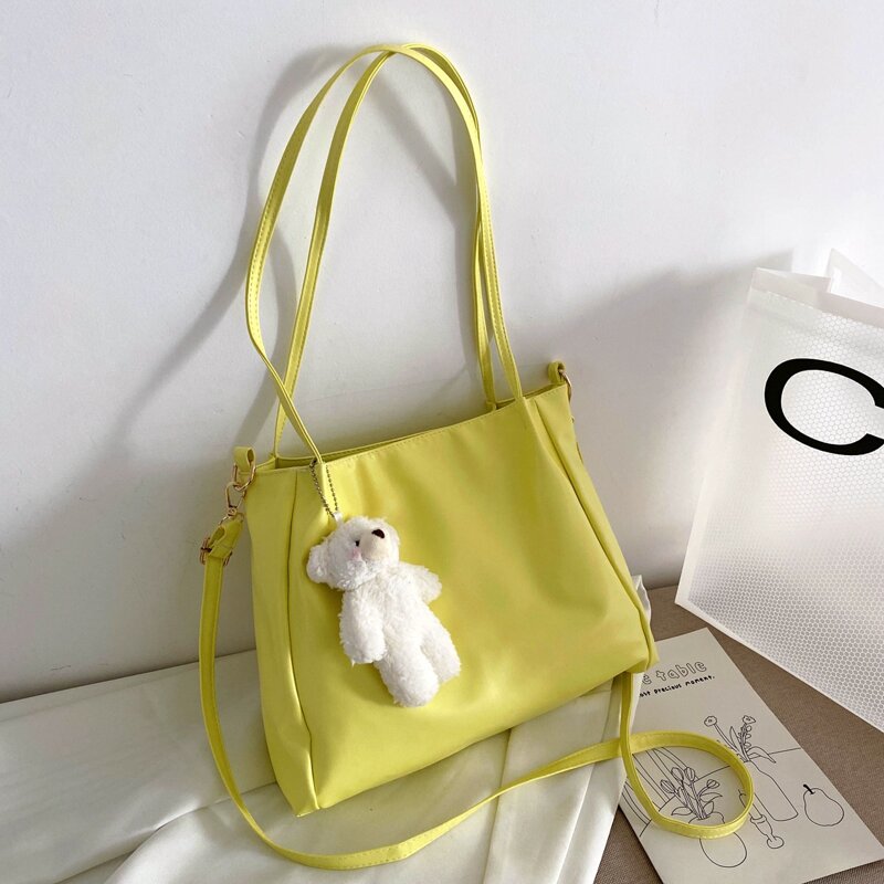 

Solid Tote Bag With Bear Bag Charm, Yellow