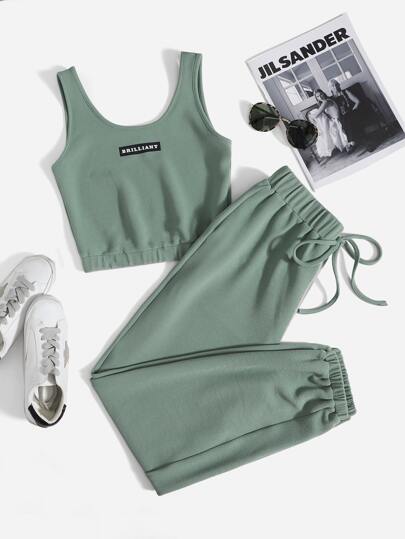 طقم تانك توب بجرافيك عبارة وبنطلون رياضي