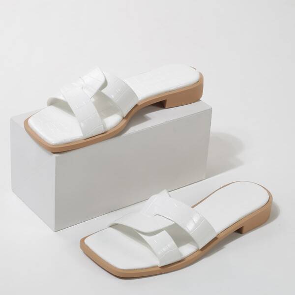 

Croc Embossed Twist Slide Sandals, White