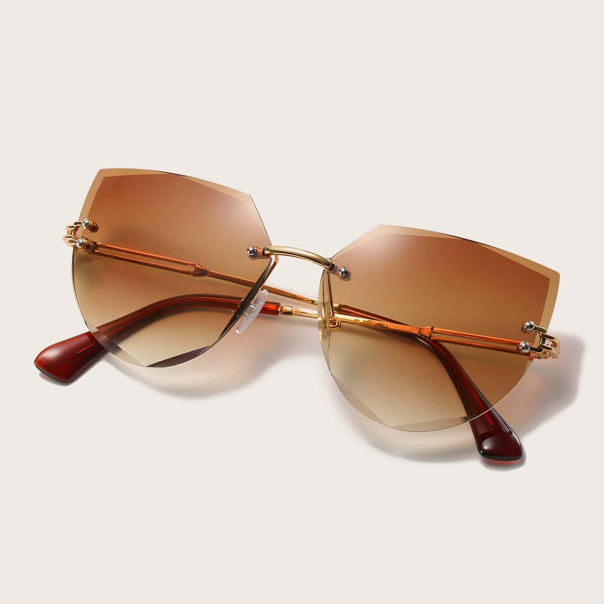 

Irregular Lens Rimless Sunglasses